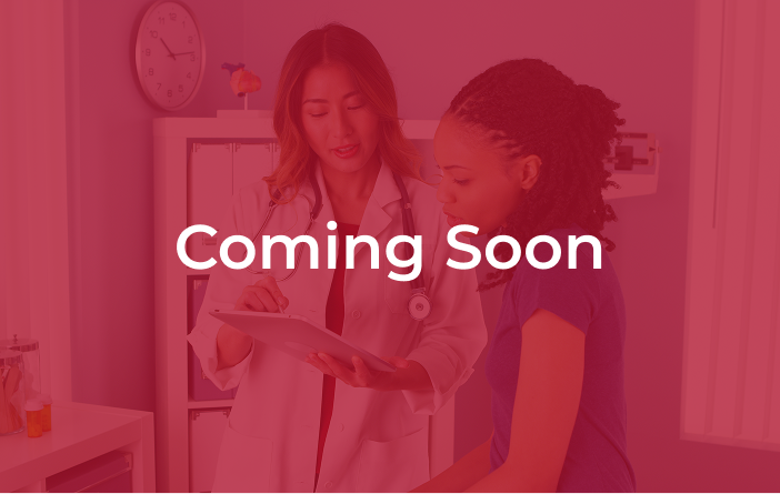 Medical professional speaking with patient